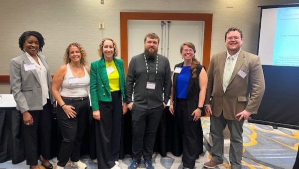 Ashley Orr and Jacob Cribbs with colleagues at the 2024 LERA Conference.